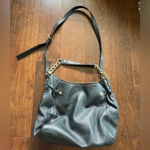 Black leather Michael Kohrs purse